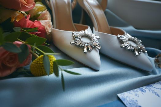 Wedding rings and wedding invitation. Shallow dof.