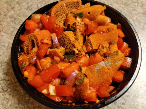 Ethiopian food injera bread and onion and tomato and peppers