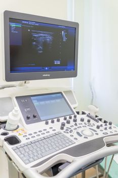 1 march, 2022. Omsk, Russiagynecologist doctor prepares an ultrasound machine for the diagnosis of the patient.