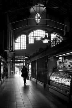 Alicante, Spain- March 28, 2022: Entrance, stalls and facade with glasses of the Alicante Food Market