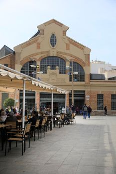 Alicante, Spain- March 28, 2022: Entrance and facade of the Central Market in Alicante