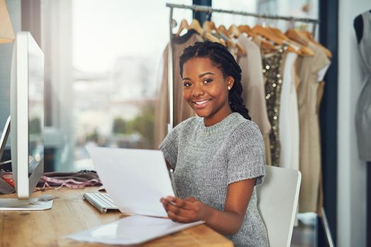 Shot of a successful young fashion designer.