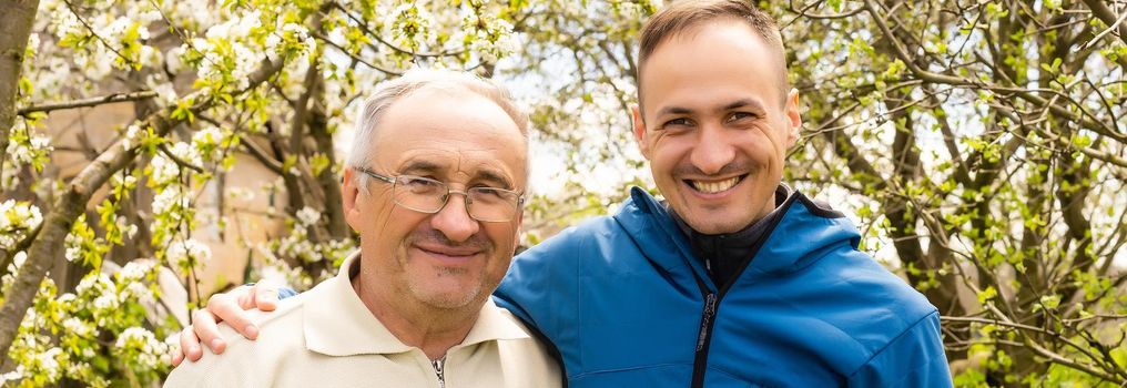 portrait of happy father and son, which are similar in appearance