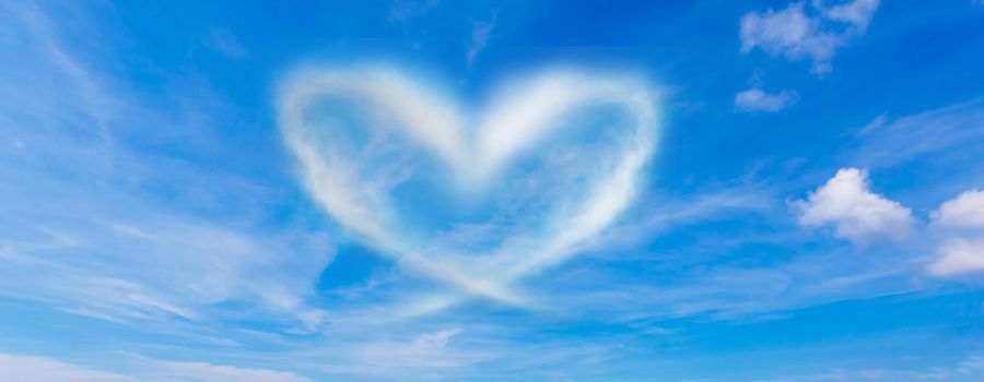 A cloud in the form of a heart. A figure from the clouds in the sky. Beautiful sky. Love. Imagination. Valentine's Day. Lovers. Fluffy cumulus cloud looks like a heart. Valentine's day symbol.