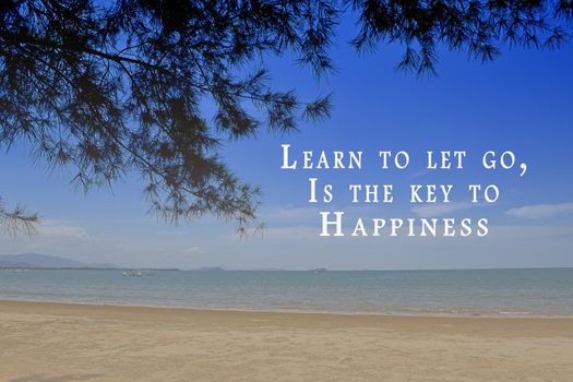 Motivational and inspirational quote on image blue ocean - Learn to let go, is the key to happiness.