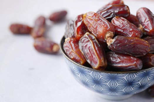 close up of fresh date fruit in a bowl