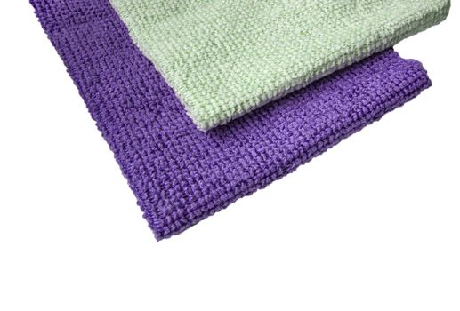 Purple and light green microfiber fabric, highlighted on a white background. New soft microfiber material for cleaning objects and surfaces. Isolated on a white background by clipping.