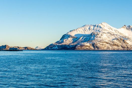 Norwegian Snow Mountains with Fjord close to Tromso