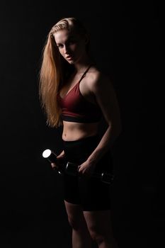 Beautiful in as dumbbells holds knightly kira shiny her a hands girl dumbbells black body, In the afternoon health woman from exercise from active athlete, sportswear wellness. Care ABS