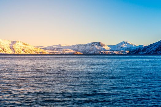 Norwegian Snow Mountains with Fjord close to Tromso