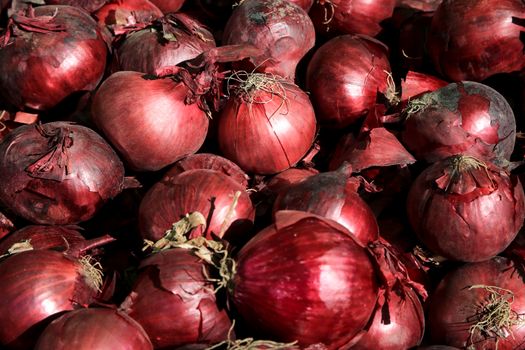 Purple Onions for sale at a farmer market stall in Spain