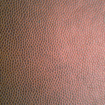 Background image of artificial textured leather close-up