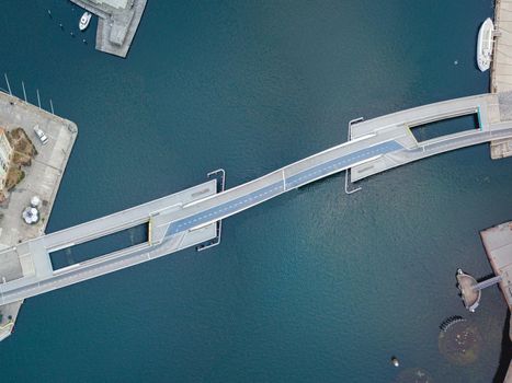 Copenhagen, Denmark - April 7, 2020: Aerial drone view of the modern Inner Harbor Bridge.