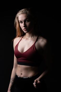 Beautiful in athletic T red shirt girl - like a a nightly kira girl fitness body, In the afternoon health fit in sport and active athlete, beautiful people. Slim model bodybuilder, perfect