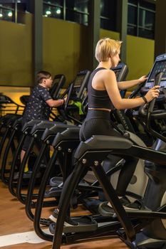 Elliptical trainer young sport machine, for fit gym for activity girl learning, screen one. Enter lifestyle living, athlete