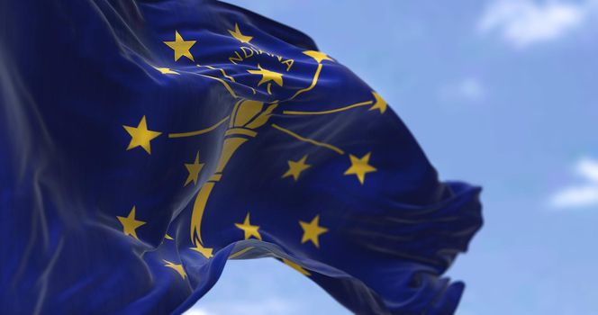 The US state flag of Indiana waving in the wind. Indiana is a U.S. state in the Midwestern United States. Democracy and independence.