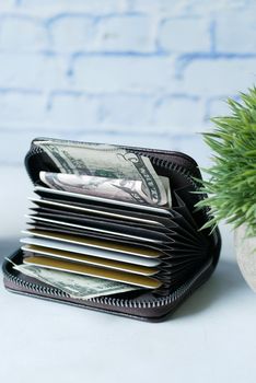 close up of credit cards in a wallet on wooden background ,