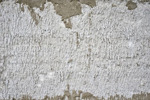 Gray concrete wall as background. Stone texture close up