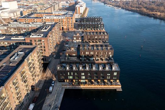 Copenhagen, Denmark - January 10, 2022: Aerial drone view of Piers, modern residential apartments in Sydhavn district.