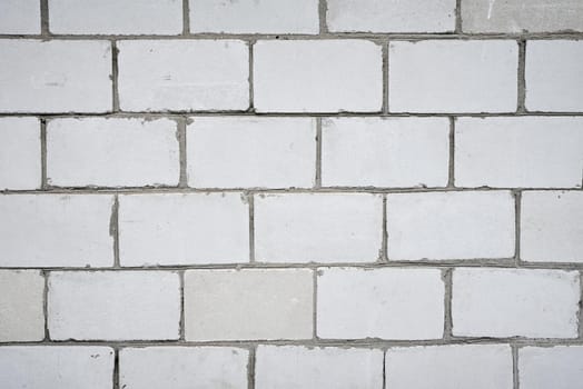 White wall background, close up. Abstract brick texture