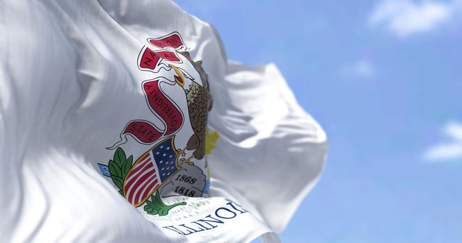 The US state flag of Illinois waving in the wind. Illinois is a state in the Midwestern region of the United States. Democracy and independence.