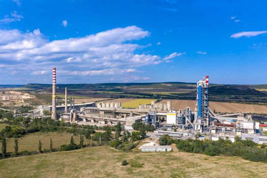 Aerial view from drone of cement factory.  The industrial landscape of cement factory