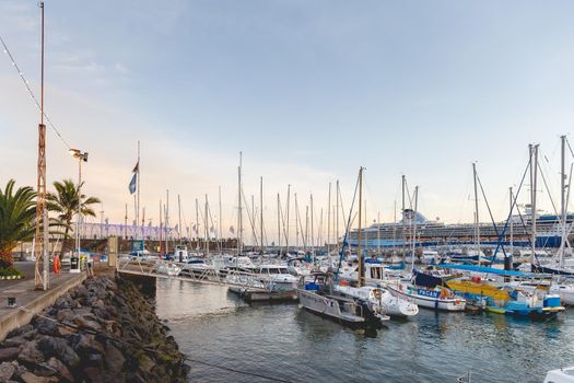 Funchal, Madeira, Portugal - December 31, 2021: View of Funchal marina where people gather in the evening to watch the new year fireworks