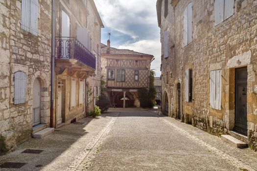 Monflanquin, France - October 17, 2021: architectural detail of typical houses in the city center on an autumn day