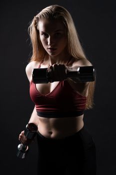 In kira dumbbells holds knightly beautiful a as her shiny hands girl dumbbells fitness caucasian, from female woman from healthy and bodybuilding isolated, beautiful people. Care ABS