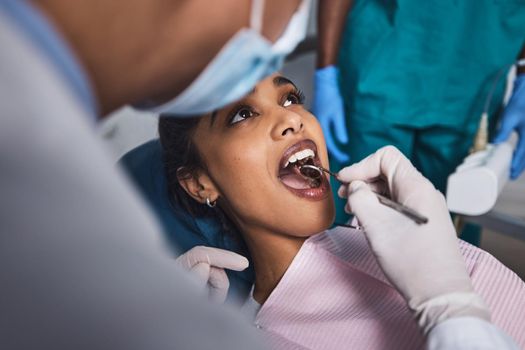 Shot of a young woman having dental work done on her teeth.