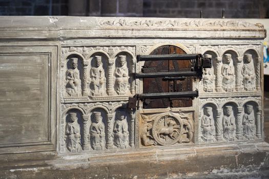 SAINT JUNIEN, FRANCE - DECEMBER 26, 2019 : Stone tomb or sarcophagus of Saint Junien in a church