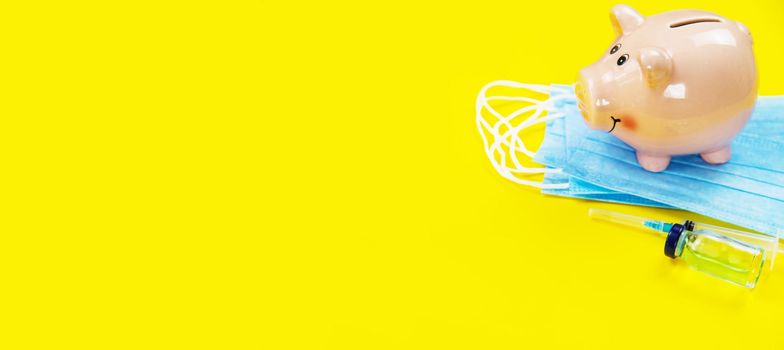 medical supplies on a yellow background, pills water treatment mask virus.