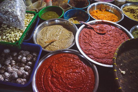 Assorted Indonesian fermented shrimp paste called Trassi, sold in the local market stalls in Medan City North Sumatra, Indonesia