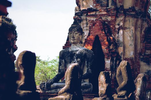 Ancient temple ruins in Wat Choeng Tha, part of the famous Ayutthaya Historical Park in Thailand