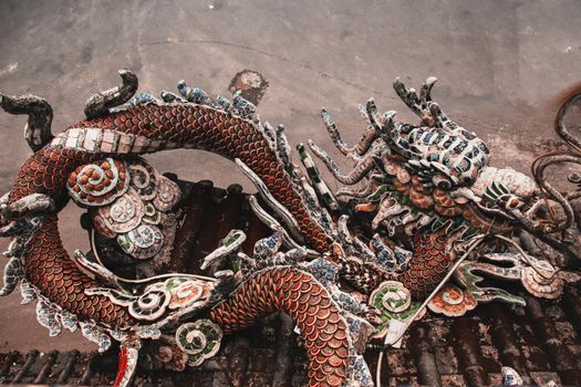 Mosaic dragon sculpture in the famous temple grounds or Hoa Long Vien in Linh Phuoc Pagoda in Da lat, Vietnam