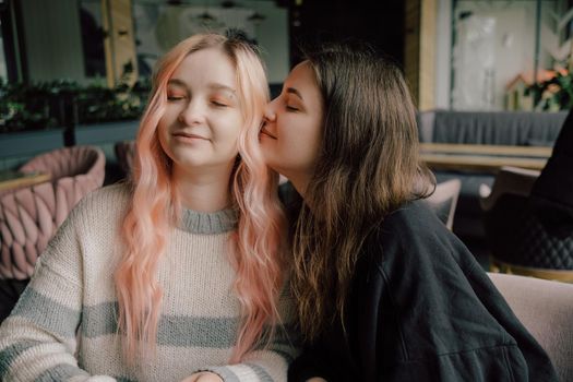 Beautiful lesbian couple kissing. LGBT and same sex marriage concept