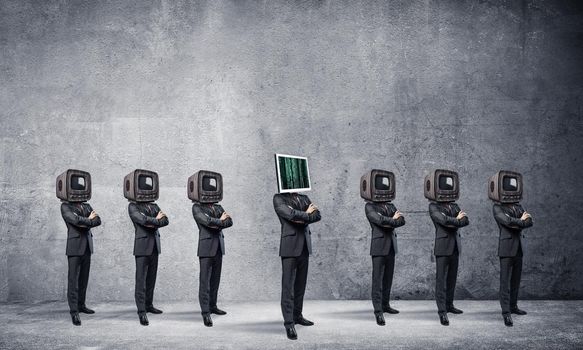 Businessmen in suits with old TV instead of their heads keeping arms crossed while standing in a row