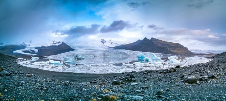 Glacier lake panorama with massive glaciars in the background, Iceland