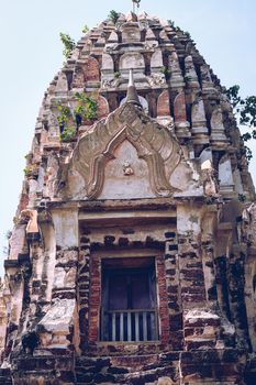 Close up of the Central prang or tower of Wat Ratchaburana in Ayutthaya Historical Park in Thailand