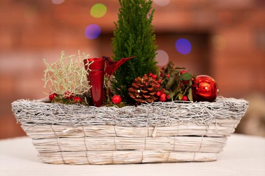 The close up frame shows a Christmas reed prepared to celebrate the ongoing Christmas season. In the distance you can see a blurred background with a fireplace