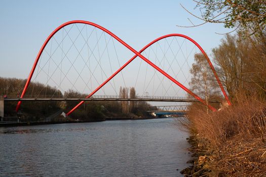 Bridge crossing the Rhine-Herne-Channel during sunset, Nordsternpark, Gelsenkirchen, Germany