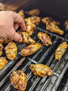 Chicken meat fried on a barbecue grill