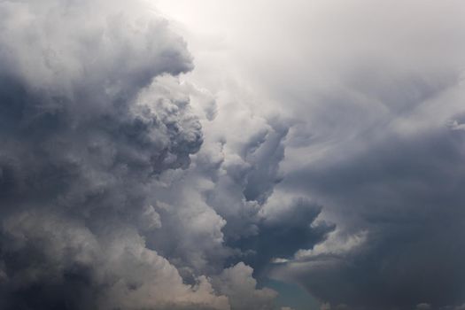 Heavy dark storm clouds before rain. Dramatic clouds become dark gray before raining