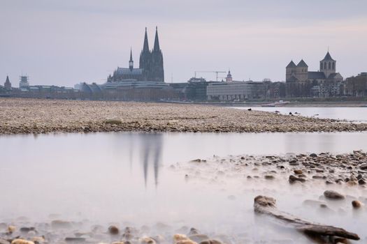 Low water of the Rhine river in Cologne, drought in Germany