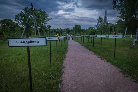 Monument in memory of the lost villages. Villages abandoned after the Chernobyl accident. Plaques with the names of settlements