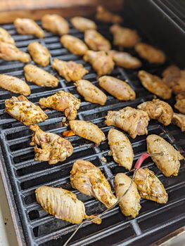 Chicken meat fried on a barbecue grill