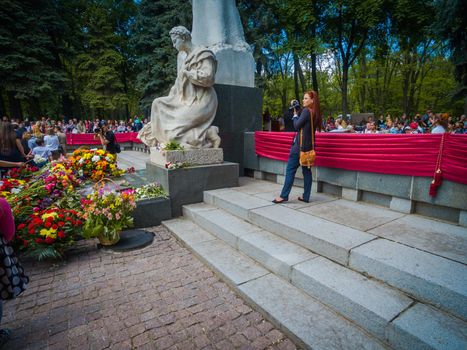 Kryvyi Rih, Ukraine - 05.09.2021 : Unidentified veterans lay flowers at Victory Monument during the celebration of Victory Day on May 9