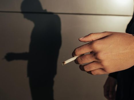 Weed joint and storing container on a black background