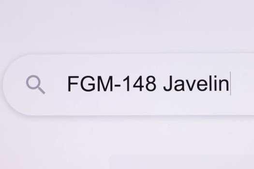 fgm148 Javelin - Internet browser search bar typing destination text. Typing the word Javelin in the browser on a pixelated computer screen