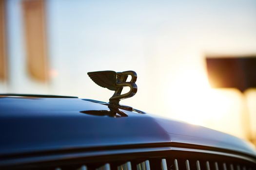 Kyiv, Ukraine - October 02, 2019: Bentley logo on the hood of Mulsanne. Mulsanne - launched in 2010 - is the only model of Bentley, carrying the Flying B distinctive hood ornament